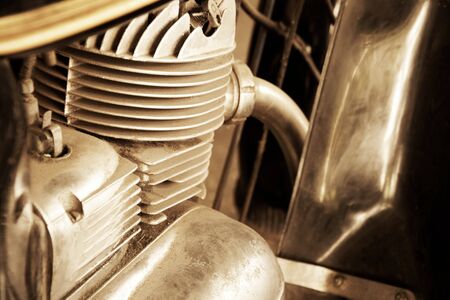 Old motorcycle motor engine in vintage photo.の写真素材