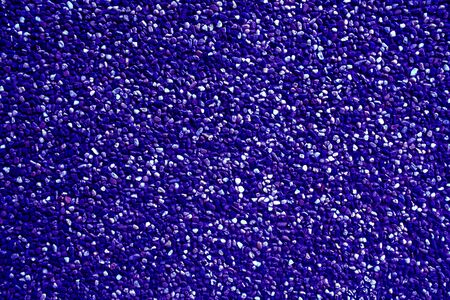 Small purple pebbles create nice pattern, gravel texture.の写真素材