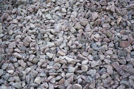 Road gravel and granite gravel texture. Crushed Gravel background. Pile of Stones texture. Industrial coals.の写真素材