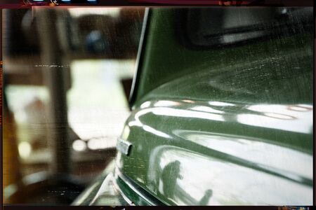 Polished car body with light reflection, sunny bunny on old vintage car, business consept.の写真素材