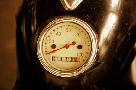 Vintage old Motorcycle speedometer with red arrow.の写真素材