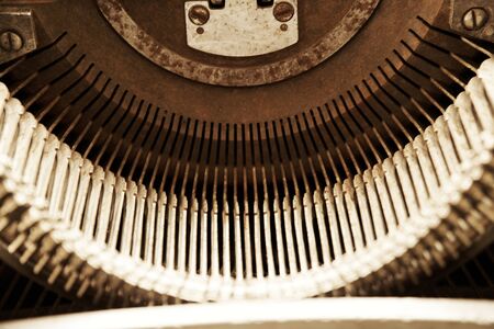 Old typewriter in antique photography vintage simulated, grunge photo.の写真素材