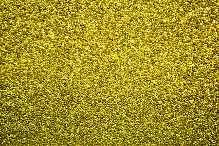 Dandelion colored pebbles create nice pattern, gravel texture.の写真素材