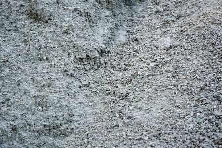 Road gravel, sand and granite gravel texture. Crushed Gravel background. Pile of Stones texture. Industrial coals.の写真素材