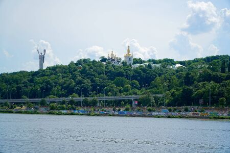Kyiv cityscape with the Motherland Monument, Ukraine, view from Dnieper river.の写真素材