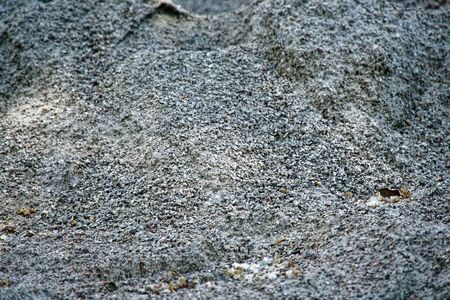 Road gravel, sand and granite gravel texture. Crushed Gravel background. Pile of Stones texture. Industrial coals.の写真素材