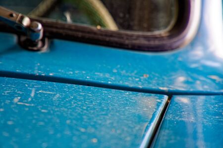 Detail of retro car window and body part, selective focus.の写真素材