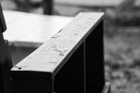 Drops of water on the wooden surface - handrail chair.の写真素材
