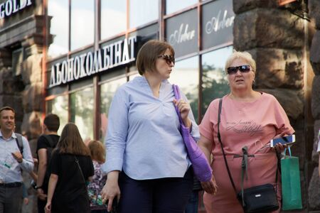 Kyiv, Ukraine, 06 July 2019: Crowd of anonymous people walking on busy city street.のeditorial素材