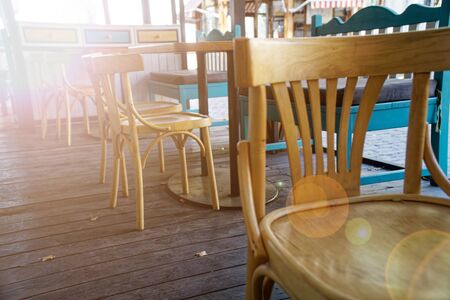Wooden Vintage chairs in cafe, modern cozy interior.の写真素材