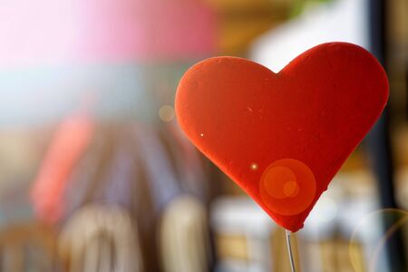 Decorative soft red heart with defocused background.の写真素材