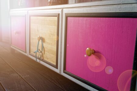 Colorful designer Wooden Drawer, cozy cafe interier.の写真素材
