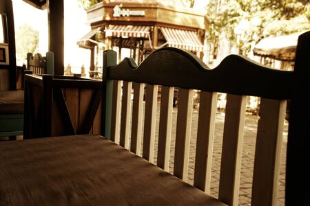 Old vintage wooden chair, table and bench.の写真素材