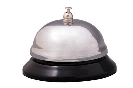 Close up of a reception bell over a white background