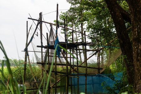 Fisherman in the countryside of Thailand, Fishing nets are used to catch fish.