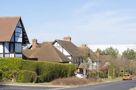 MILTON KEYNES, ENGLAND - MARCH 03, 2015: Sunny view at streets and residential buildings of Two Mile Ash district in spring day, United Kingdom.のeditorial素材