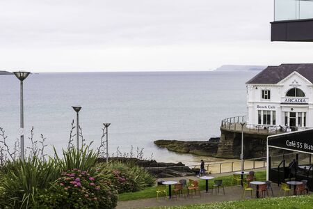 Portrush, UK - July 1, 2017: General view at quay, beach cafe and people passing by, County Antrim, Northern Irelandのeditorial素材