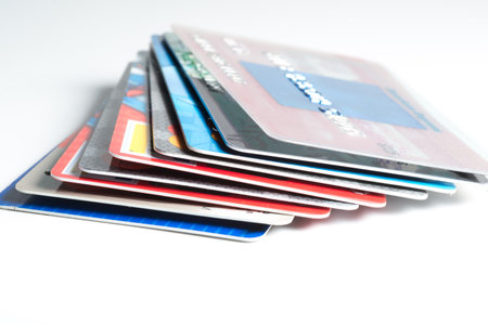Close up of stack of credit cards on white background,illustrative editorialのeditorial素材