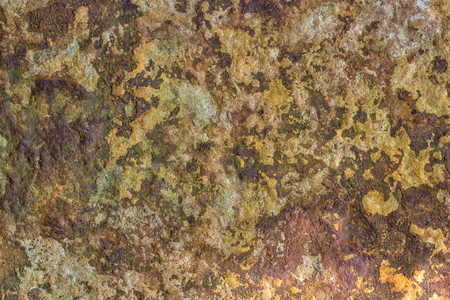 Closeup of a stone surface with earthy colorsの写真素材