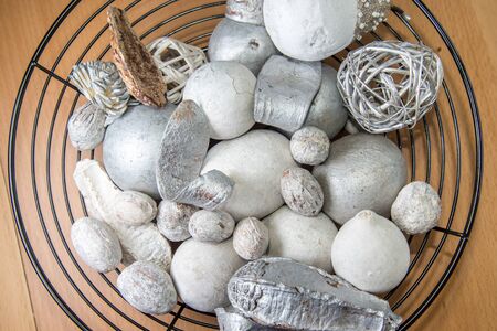 Winter decorations in a bowlの写真素材