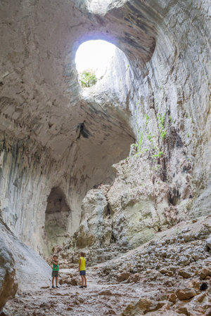 Karlukovo Bulgaria-23 July 2015 The Eyes of God formation in the Prohodna cave.For editorial use onlyのeditorial素材