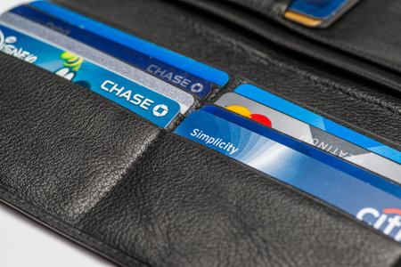 Chicago,IL,USA,Feb-12,2017,Close up of an open wallet with credit cards with Chase,Chase Disney,Citi Simplicity and Master card logos (for editorial use only)のeditorial素材