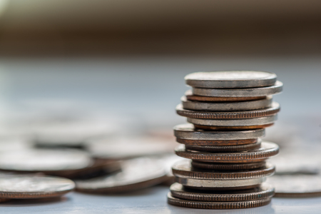 Stack and piles of coinsの写真素材