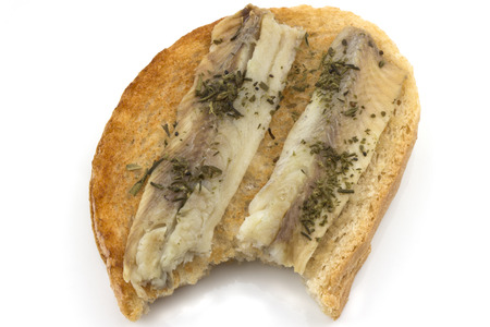 Homemade food - toast with sprats on white background.の写真素材