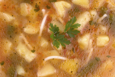 Homemade soup, made with potatoes,vermicelli,green beans and herbs.の写真素材