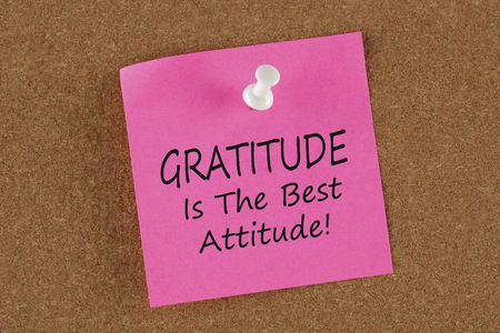 Gratitude Is The Best Attitude written on remember note concept on a cork board.Business Concept.の写真素材