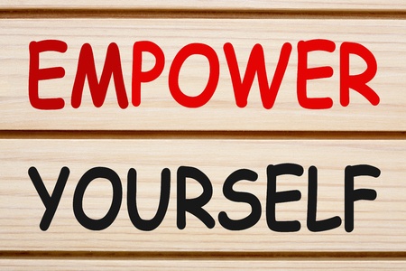 EMPOWER YOURSELF written on wood wall decor. Business concept.の写真素材