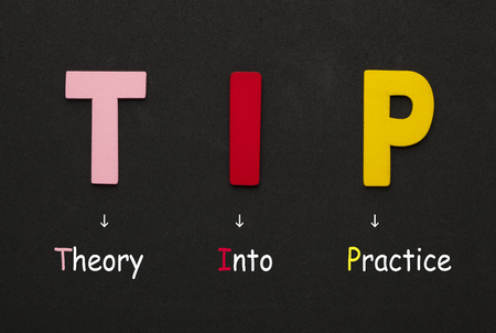 TIP (Theory Into Practice) words on black background. Acronym business concept.の写真素材