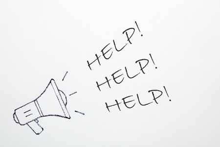  Help word with megaphone on white background. Business concept.の写真素材
