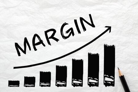 The word Margin with directional arrow written on wrinkled lined paper. Diagram in the shape of a staircase, financial concept.の写真素材