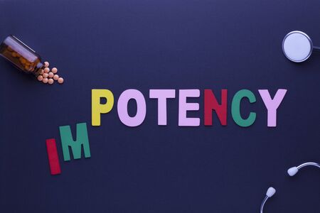 The word impotency transformed to potency made of colorful alphabet letters with stethoscope and pills on black background. Concept of medical and health care.の写真素材