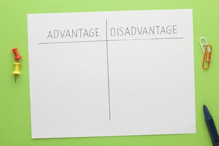 Advantage versus disadvantage concept with various stationery. Empty listの写真素材