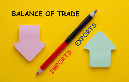 Balance of trade - import export with red, green arrow sign and colored pencil, two sided.