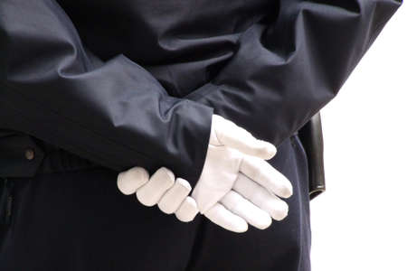 Police officer with white gloves for different uses