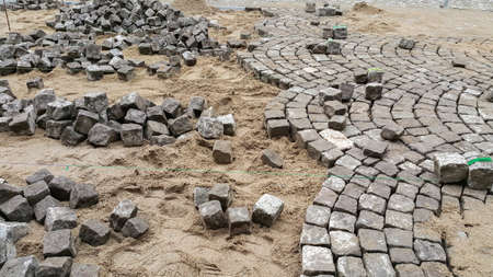 Reconstruction of a paved road in an old town.の写真素材
