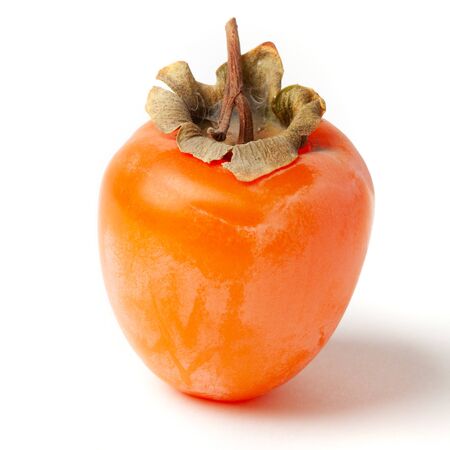Ripe, mature, fresh and Juicy persimmon isolated on white backgroundの写真素材