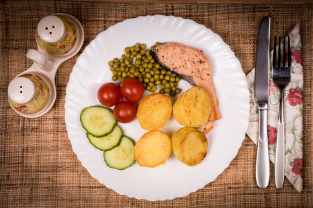 Fish with vegetables, second course,の写真素材