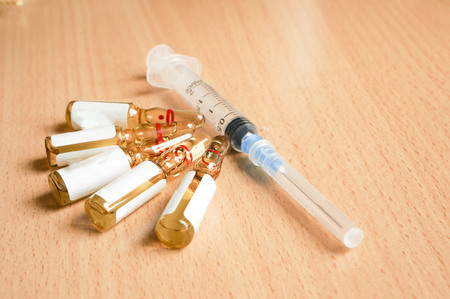Syringe and medication in ampoules for injectionの写真素材