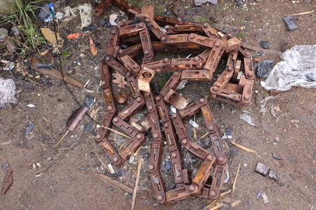 old large rusty chain from the factory machine
