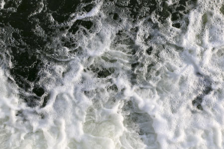 stormy creek. wave and foam in  flow. splashes, bubbles, waves, stream, ripples and crests of waves...