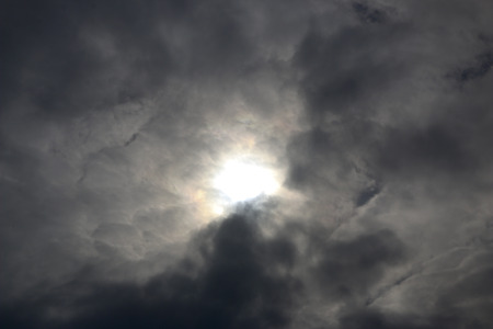 Spring. blue sky with fluffy white clouds. sun, sunlight through  clouds,  sky - spring changeable...