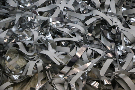 silver strips of foil and paper after a children's paper show.