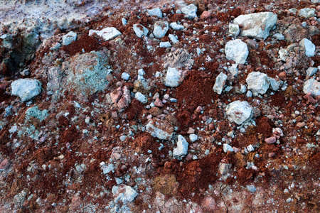 textures of various clay layers underground in clay quarry after geological study of soil. colored...