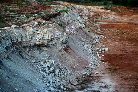 textures of various clay layers underground in clay quarry after geological study of the soil....