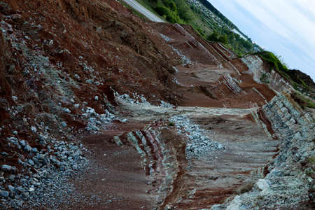 textures of various clay layers underground in clay quarry after geological study of the soil....