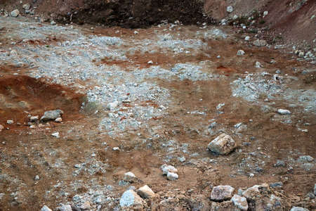 textures of various clay layers underground in clay quarry after geological study of the soil....